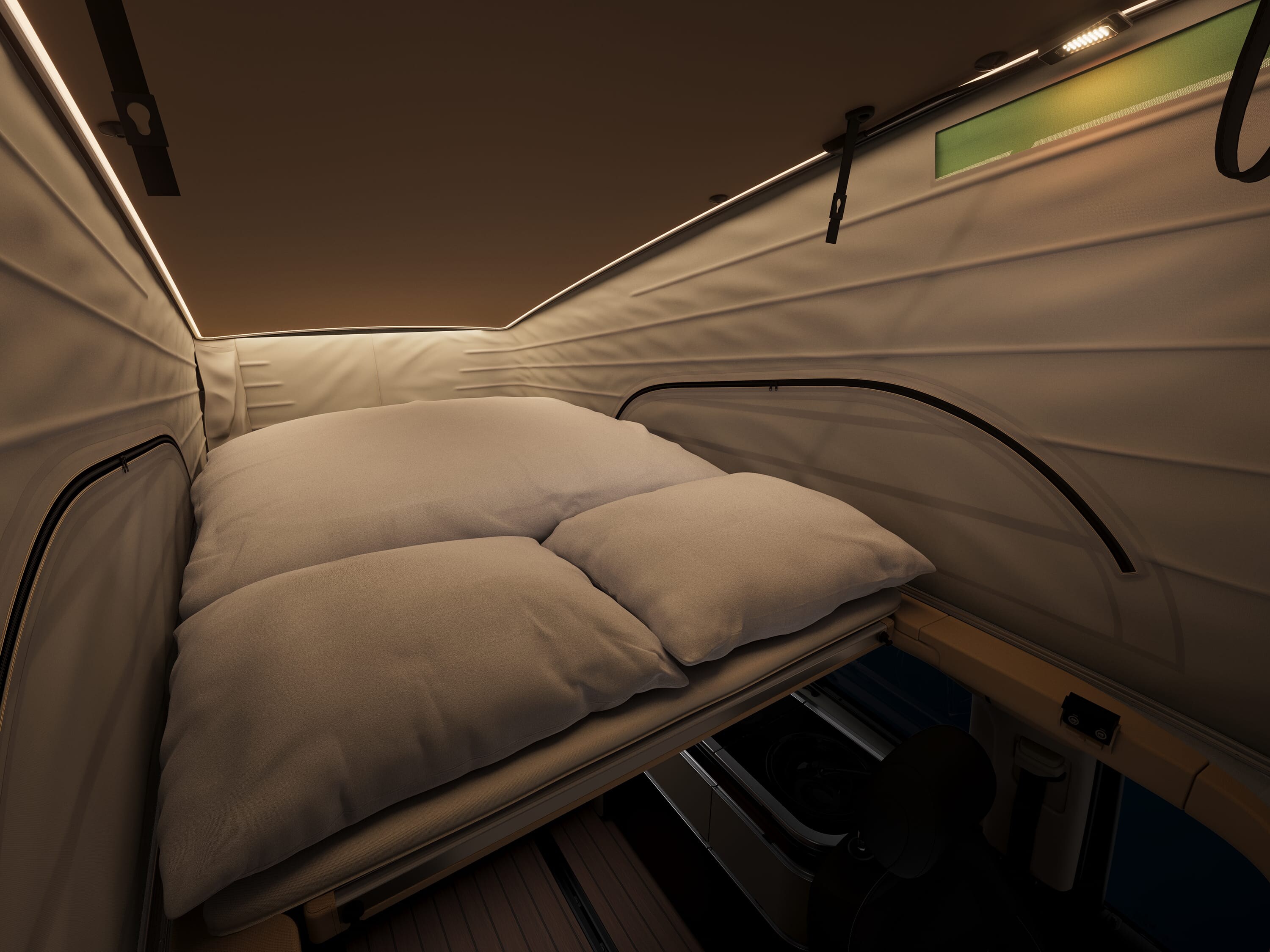Espace de couchage Mercedes-Benz Marco Polo avec un lit confortable à l'intérieur du toit relevable.
