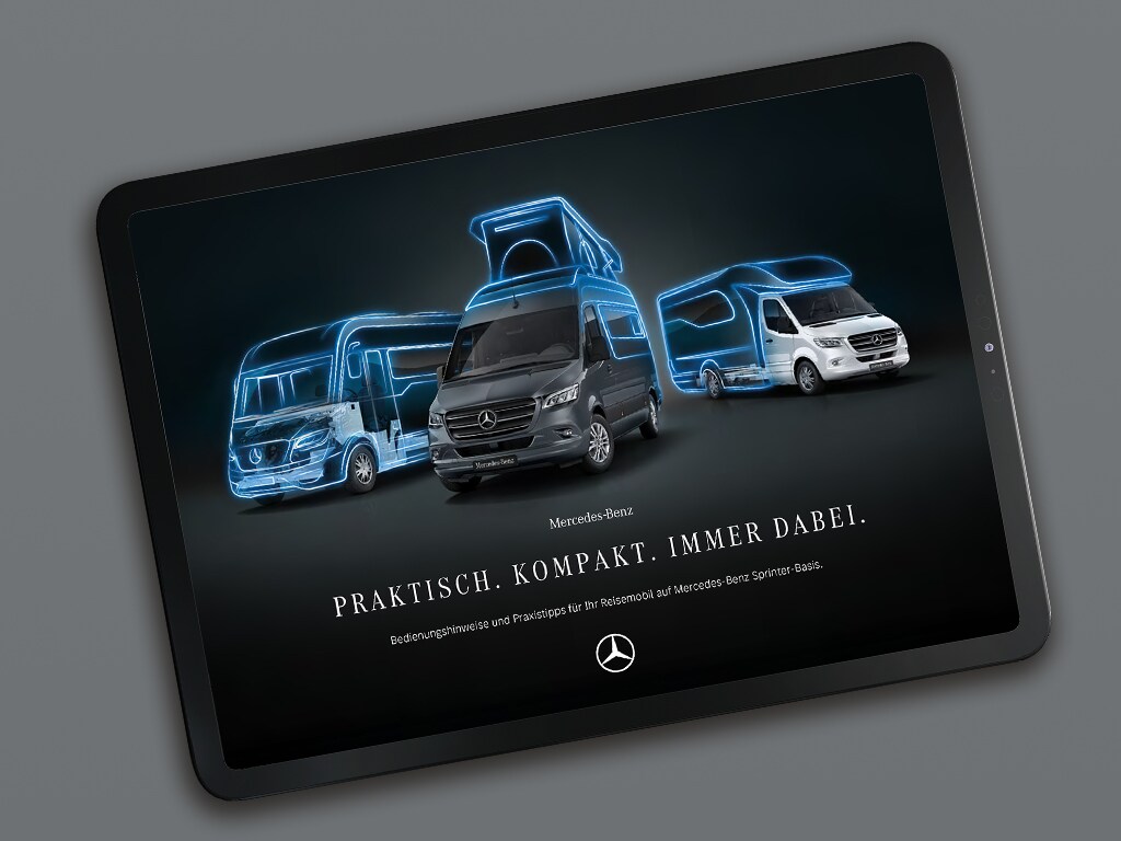 Une tablette sur laquelle figure une brochure numérique consacrée aux camping-cars Mercedes-Benz Sprinter.