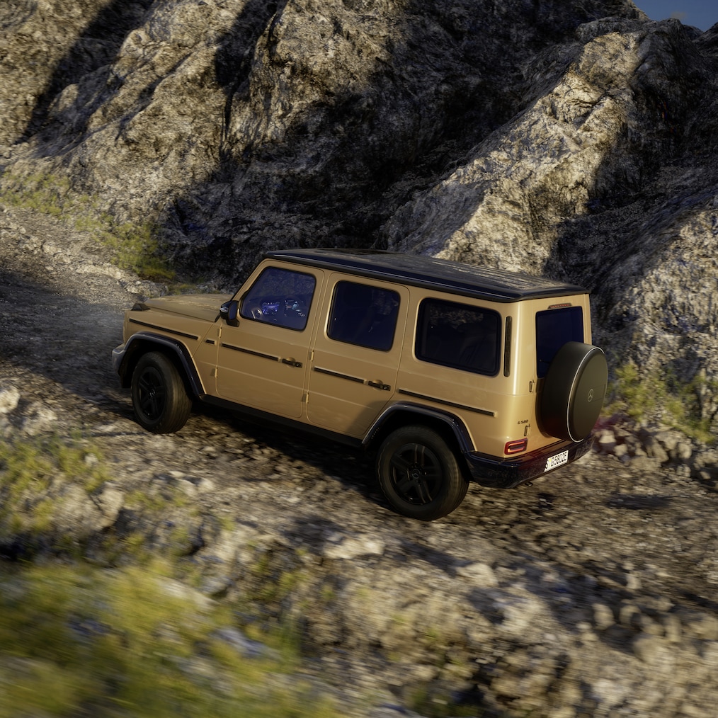 Affichages spécifiques au tout-terrain sur l'écran pour les instruments/l'écran média d'une Mercedes-Benz G&nbsp;580 qui roule en tout-terrain.