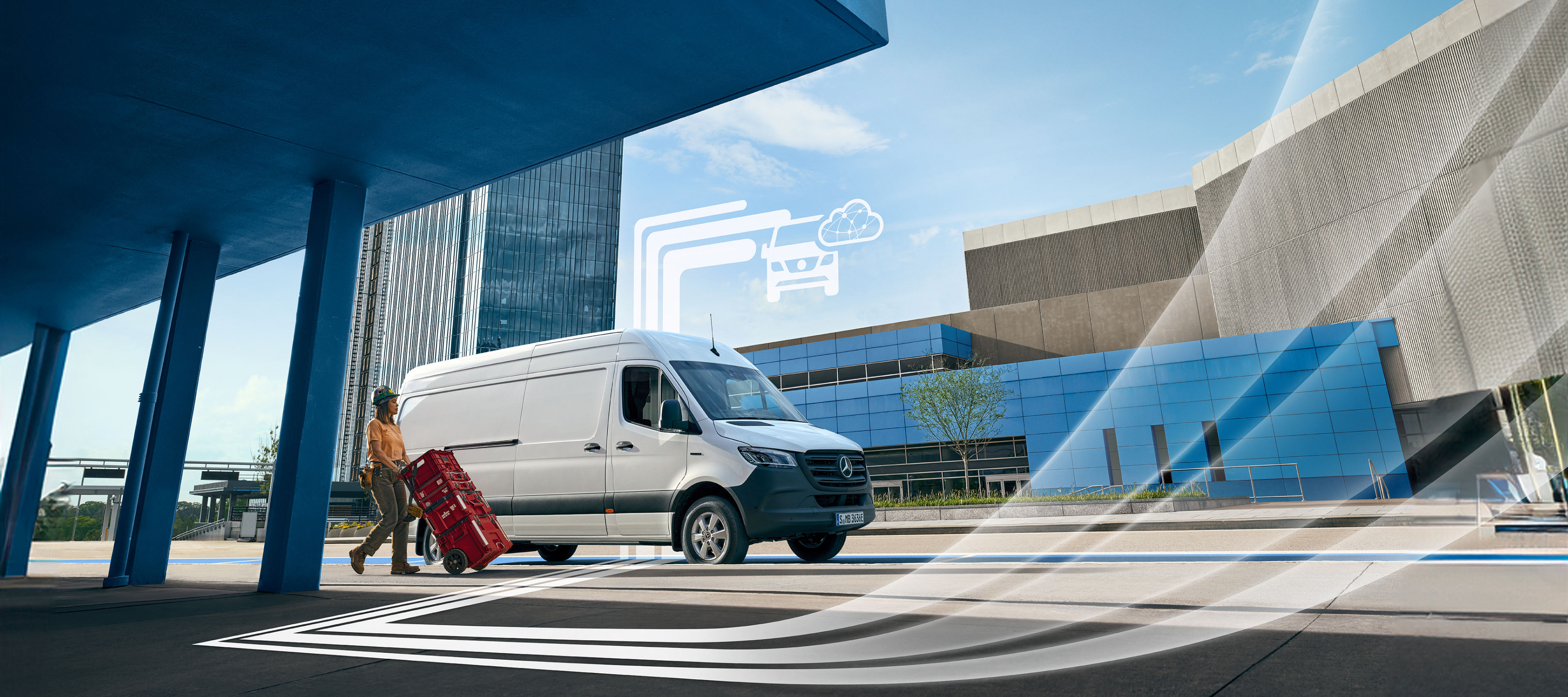 Offres digitales supplémentaires | Offres digitales | Mercedes-Benz Un utilitaire léger Mercedes-Benz avec des éléments graphiques représentant les offres digitales.