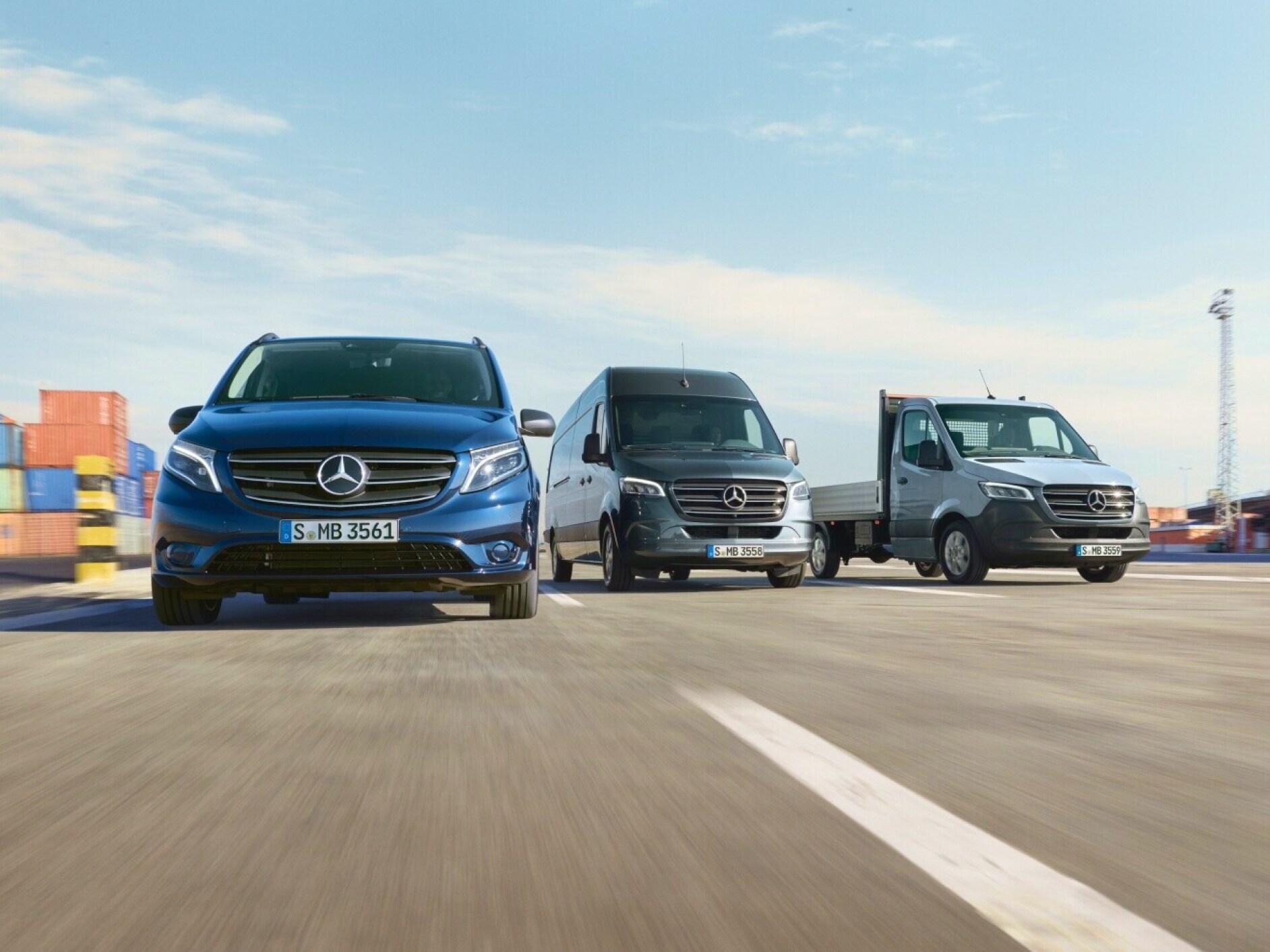 A fleet of vans with Mercedes-Benz vehicles.