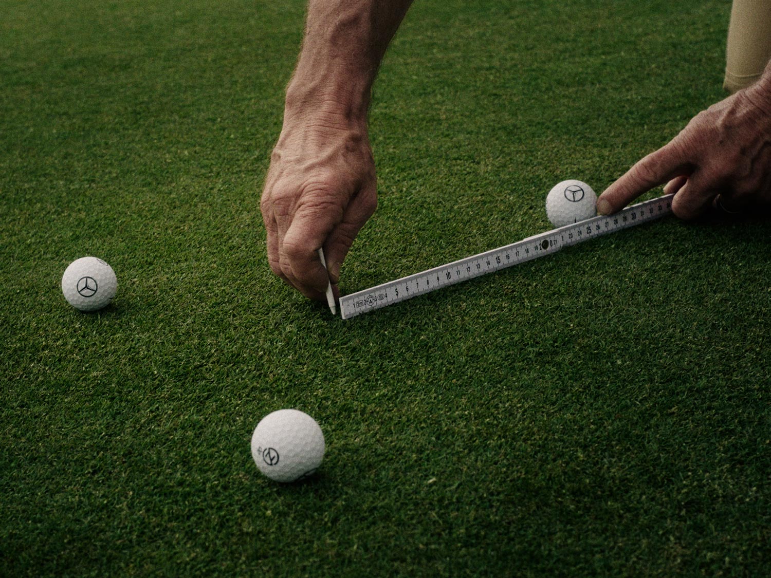 Greenkeeper Tre palline da golf sul green