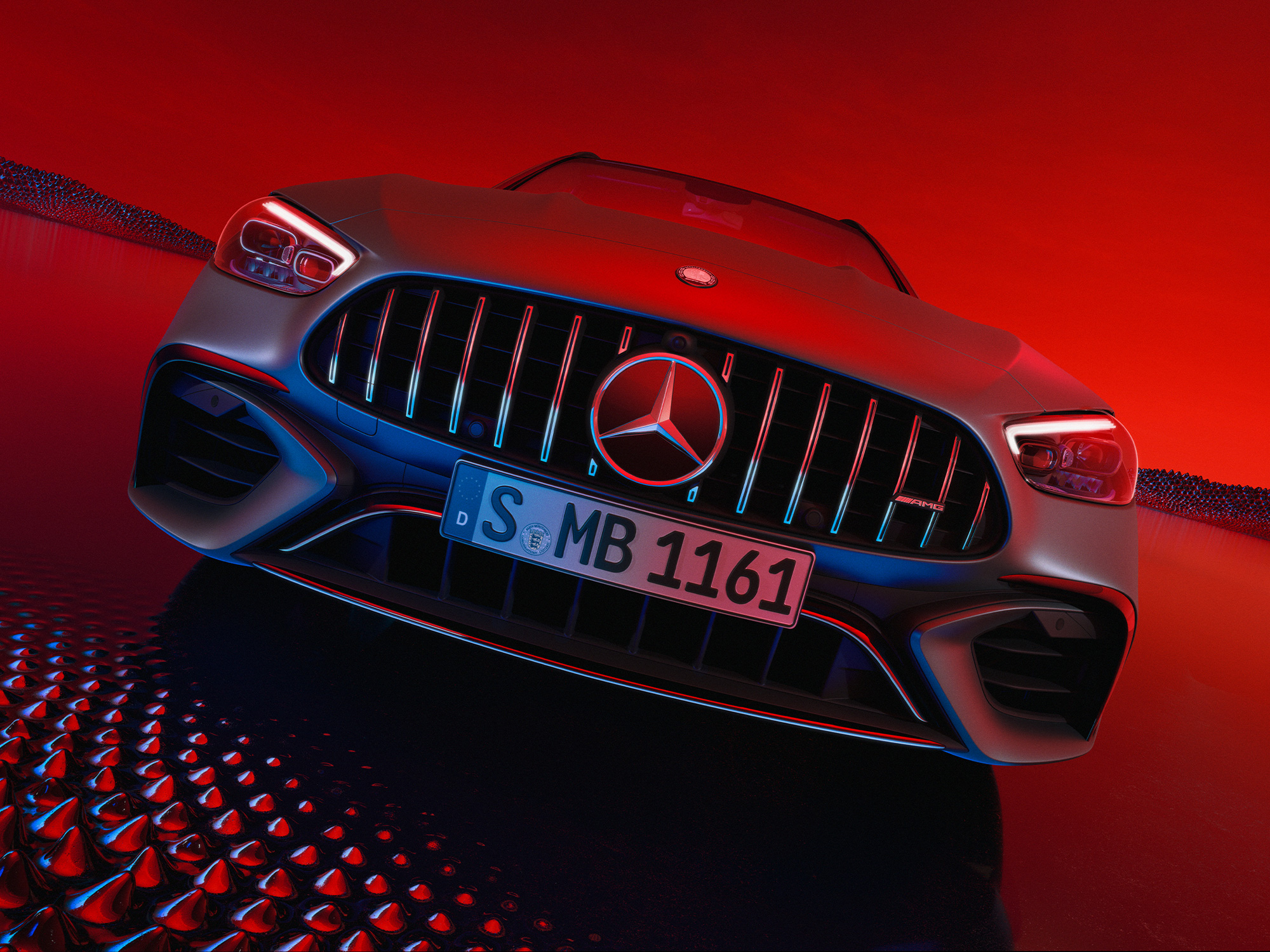 Mercedes-AMG C-Klasse T-Modell «Executive Edition». Roter Mercedes-AMG mit markantem Kühlergrill, Frontansicht.