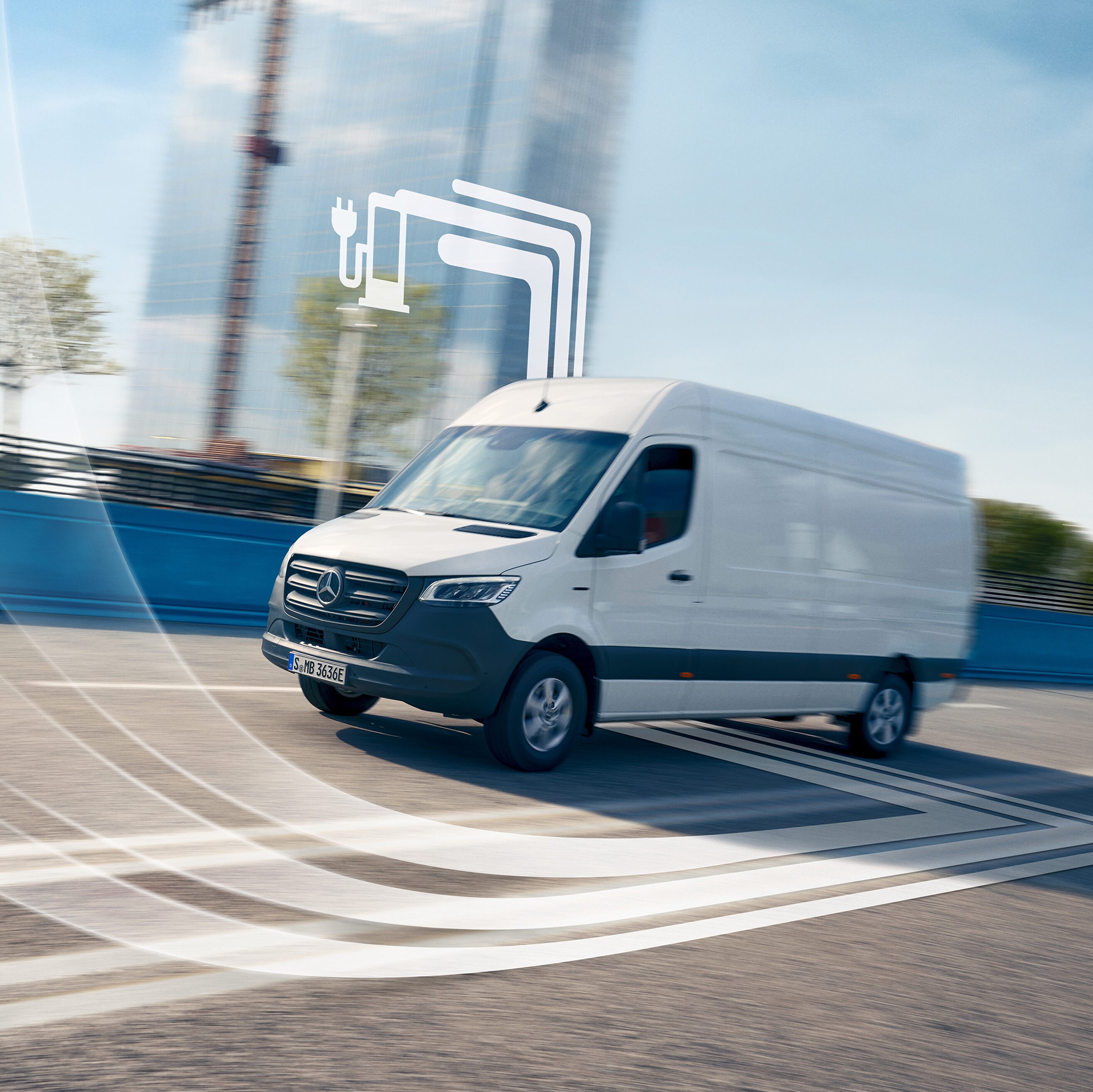 Un utilitaire léger Mercedes-Benz avec des éléments graphiques représentant les offres digitales.